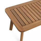 Minimalist wooden slatted table crafted from FSC-certified Acacia wood, featuring four legs and a smooth finish, perfect for outdoor furniture settings.