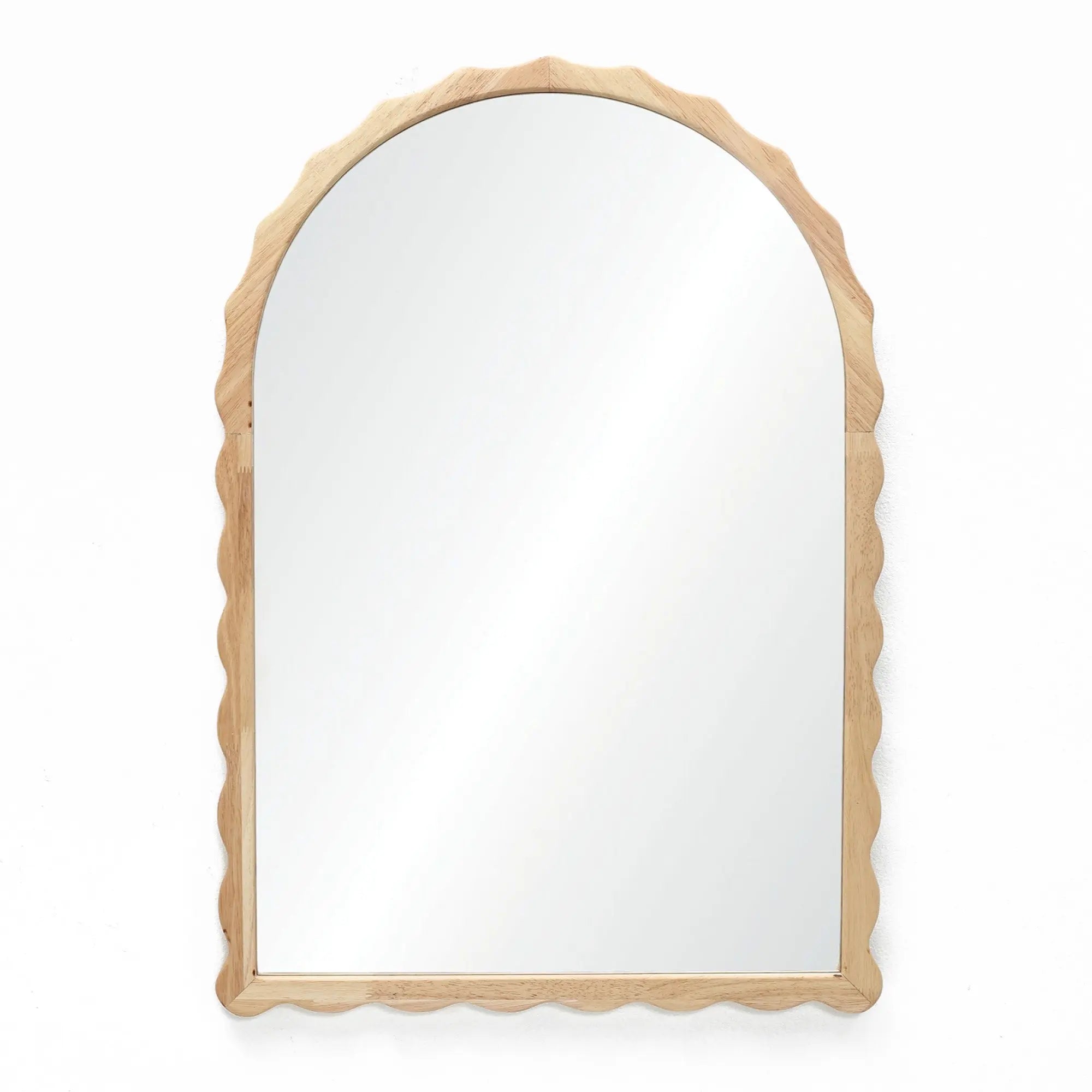 Introducing the 34-inch Arch Mirror, featuring a scalloped edge framing crafted from elegant rubberwood. Its arched top adds a touch of sophistication to any space.
