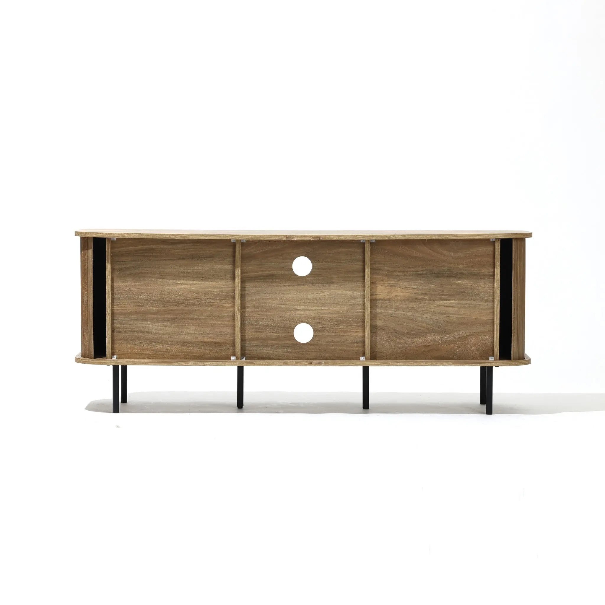 The Aria oak finish TV stand by LuxenHome, designed for TVs up to 55 inches, features a minimalist mid-century modern style with three sliding doors and circular cutouts. Elevated on black metal legs, it offers enclosed storage. The image showcases it on a clean, white background.