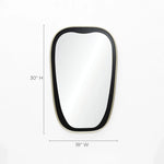 Discover the elegance of this contemporary mirror, featuring an oblong shape with a sleek black frame. Measuring 30 inches high and 18 inches wide, it stands out beautifully against a white background.