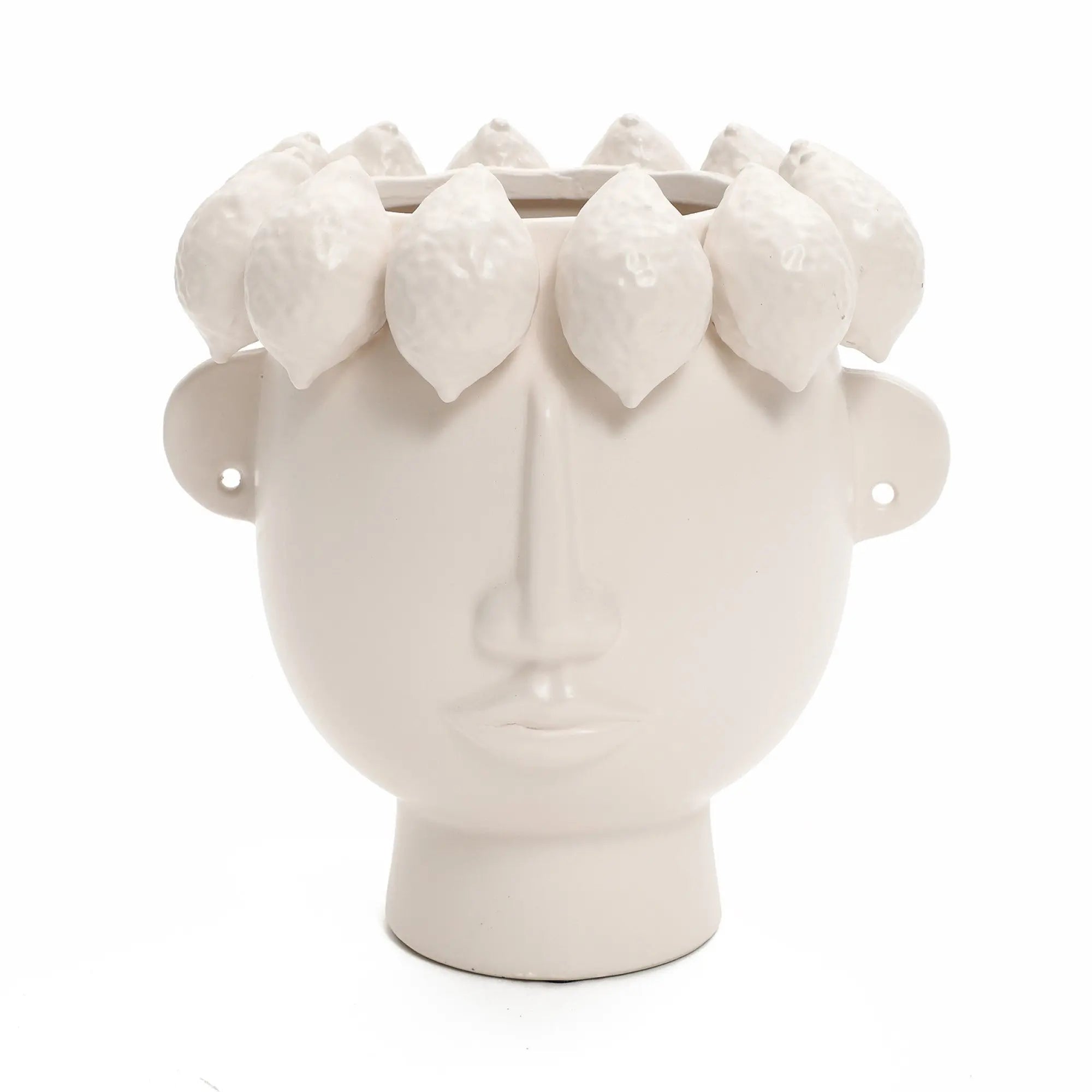 The LuxenHome white ceramic bust head vase, 9.6 high, is a modern planter shaped like a face with minimal features including a nose, lips, and ears. It features lemon-like shapes adorning its sculpted head design.
