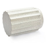 A light gray, cylindrical cement object with evenly spaced fluted sides is lying on its side against a white background—perfect as a modern side table for outdoor decor.