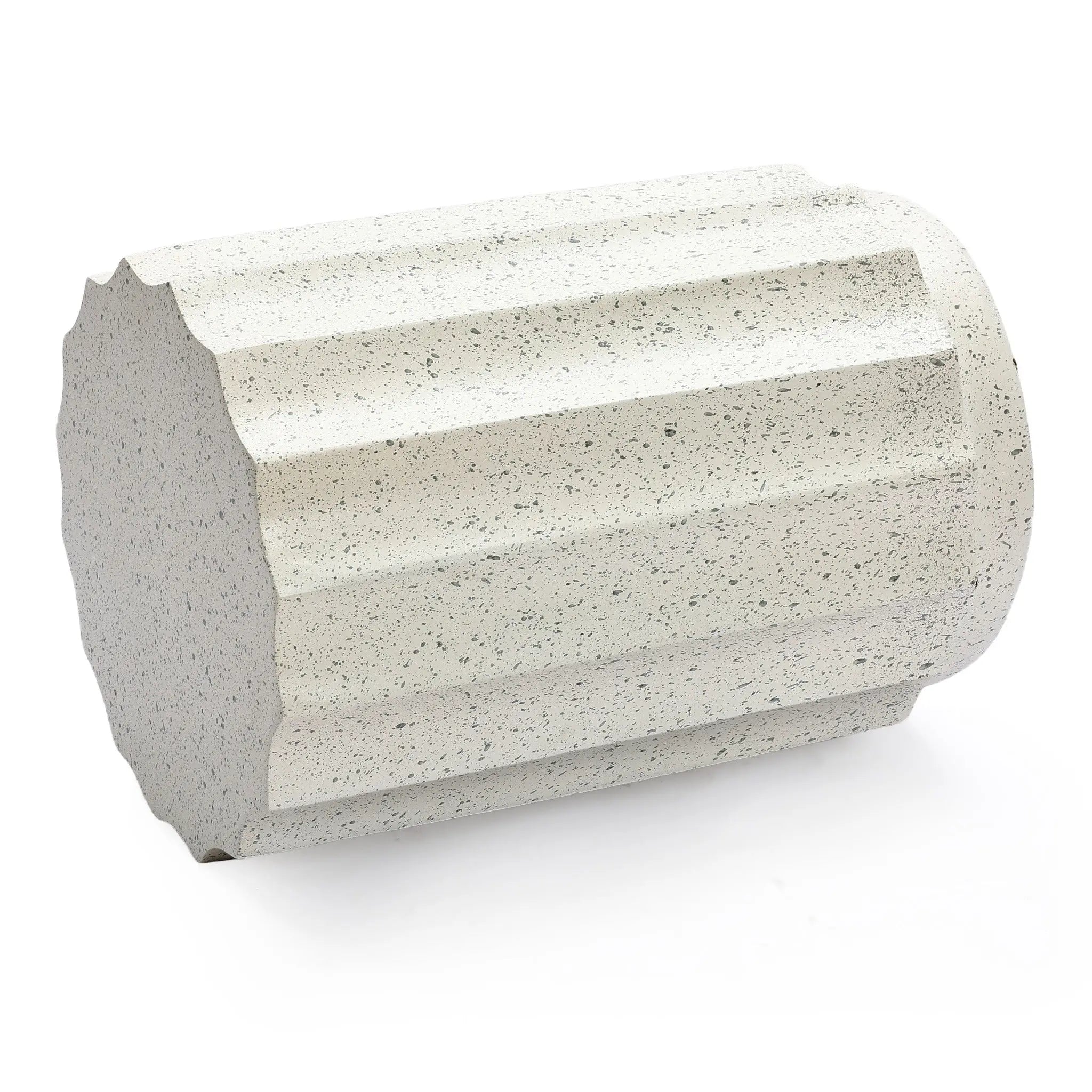 A light gray, cylindrical cement object with evenly spaced fluted sides is lying on its side against a white background—perfect as a modern side table for outdoor decor.