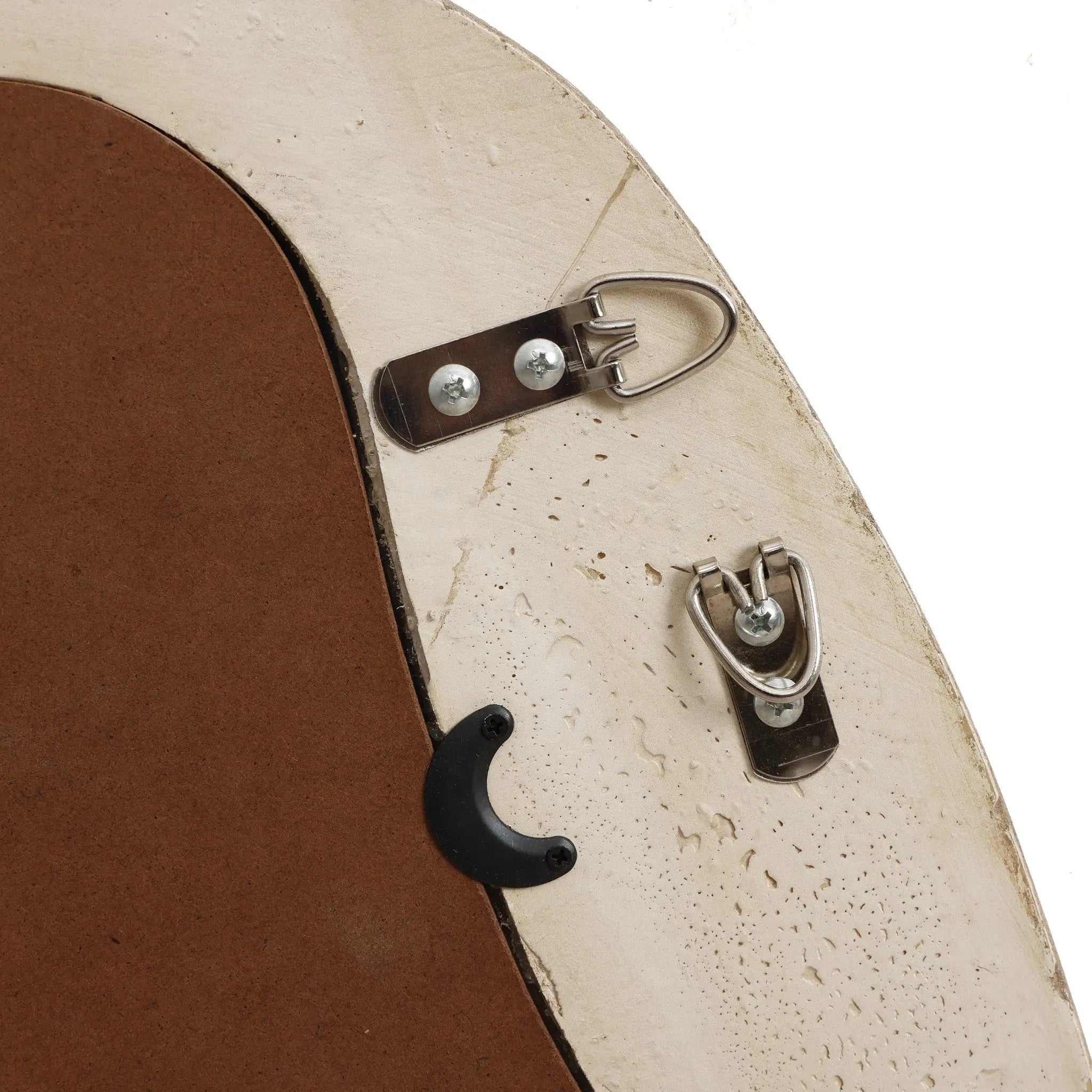Close-up of the back of a wooden picture frame, designed for those who appreciate unique home decor, featuring two metal hanging hooks and a black plastic clip on the edge.