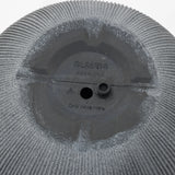 Close-up of a gray textured surface with text GL8620B and Drill Hole Here. A small circular protrusion is near the center, crafted from durable polyethylene, with markings indicating manufacturing origin. Perfect for transforming into a modern planter.