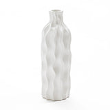 A tall, white, wavy ceramic vase stands on a plain background, showcasing its elegant design as a versatile piece that complements any decor.