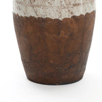 An 18.5 LuxenHome vase showcases rustic elegance and artisanal craftsmanship with a textured cream and brown surface that evokes the timeless allure of cracked earth, reflecting a classic terracotta urn design complete with practical handles.