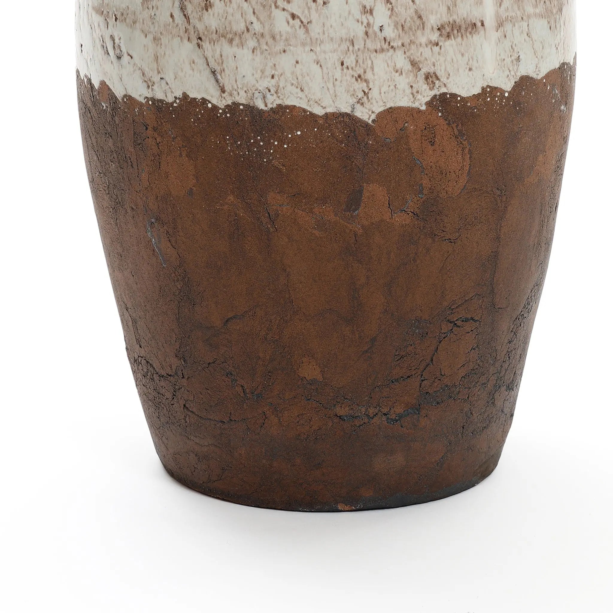 An 18.5 LuxenHome vase showcases rustic elegance and artisanal craftsmanship with a textured cream and brown surface that evokes the timeless allure of cracked earth, reflecting a classic terracotta urn design complete with practical handles.