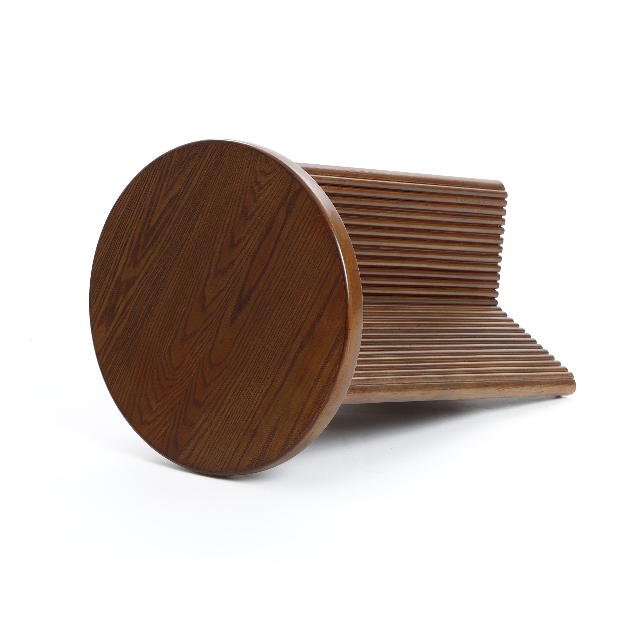 Wooden chair with a circular seat and ribbed backrest, crafted from high-quality MDF wood, set against a plain white background.