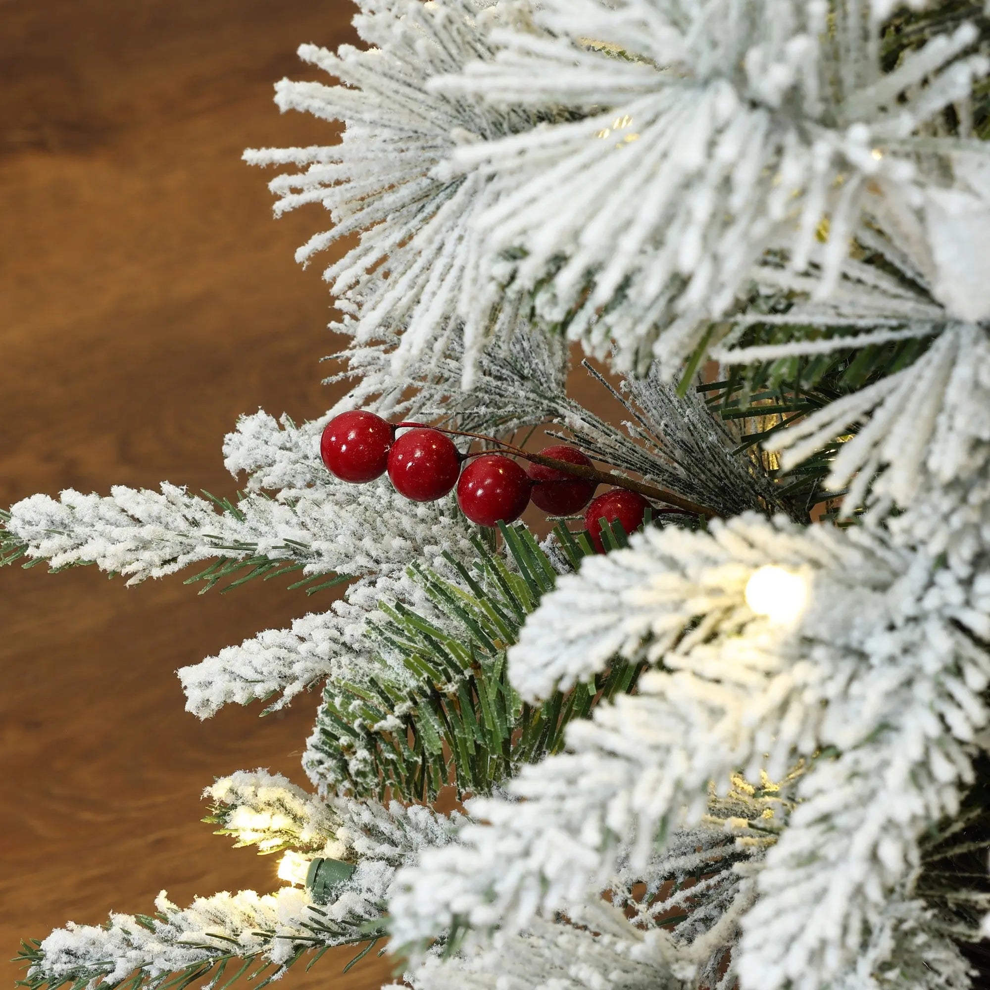 led-christmas-tree-with-cherries-and-white-branch-flocking