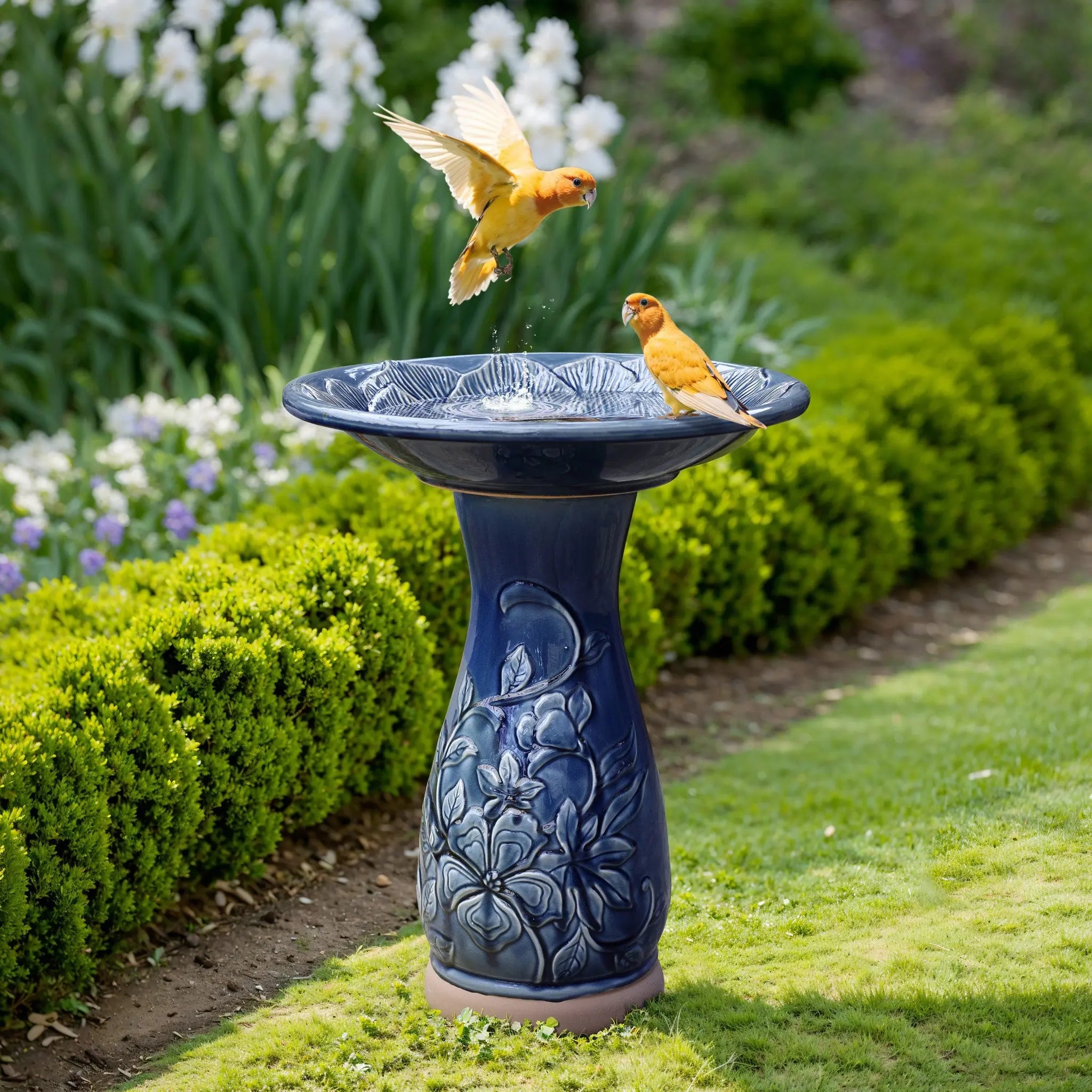 Blue ceramic birdbath with petals and vines pattern - LuxenHome