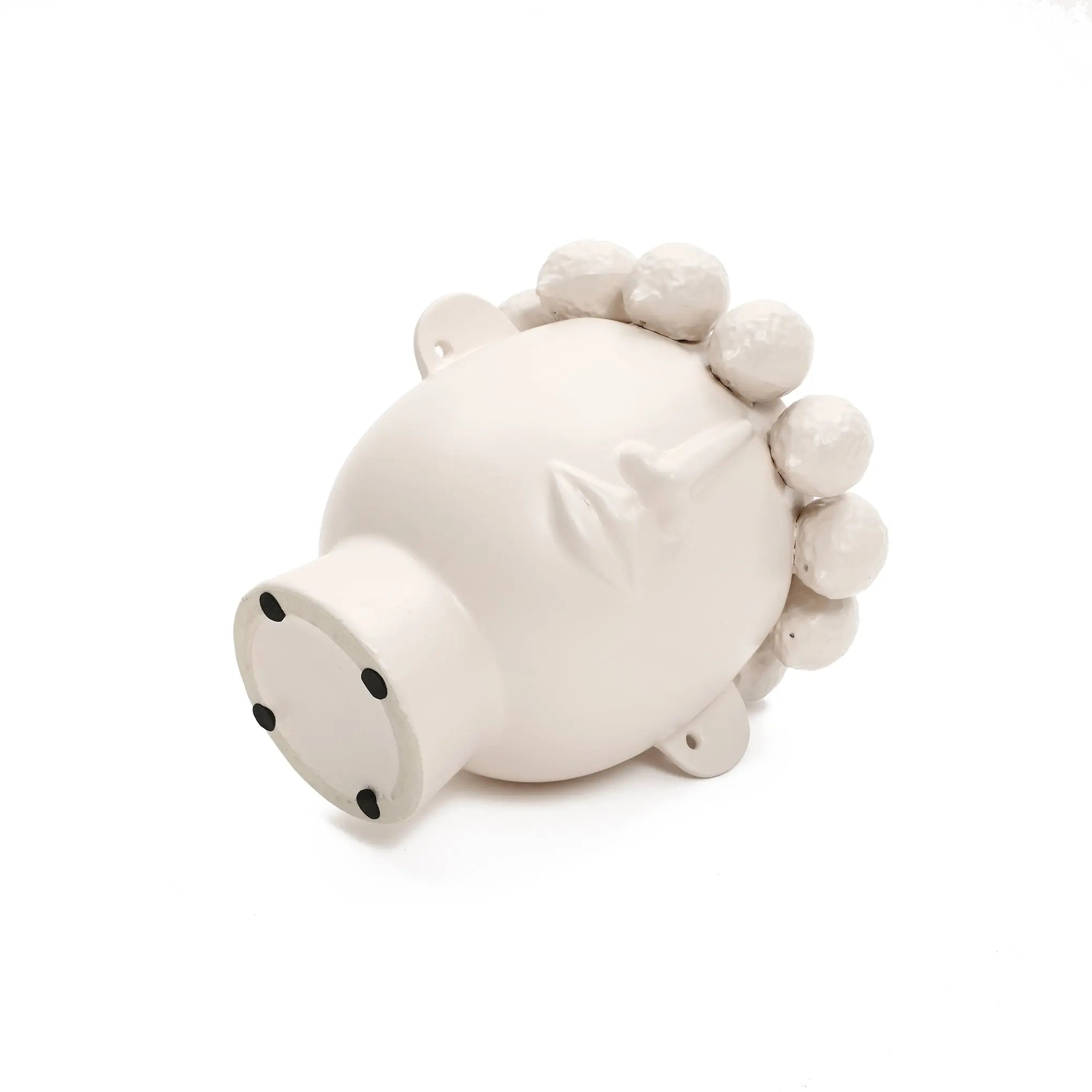 The LuxenHome White Ceramic Bust Head Vase, measuring 9.6 high, features an abstract human profile on its side. The modern design includes sculpted facial features with a nose and lips surrounded by hair-like protrusions, accented with small black dots on the flat base.