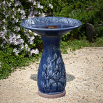 Blue ceramic birdbath with petals and vines pattern - LuxenHome