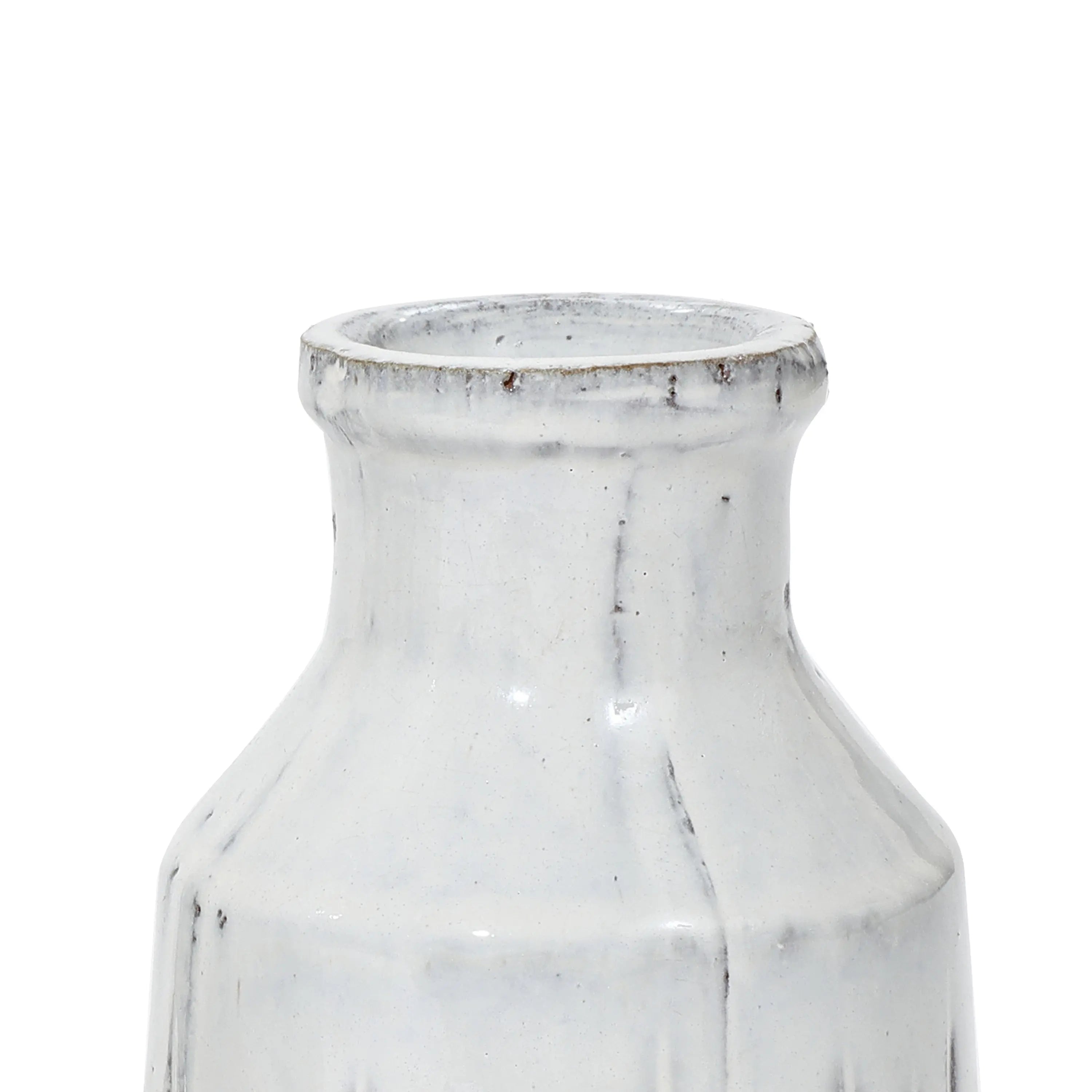 A close-up of the top portion of a white ceramic vase with a slightly textured surface and narrow neck, exuding rustic charm.