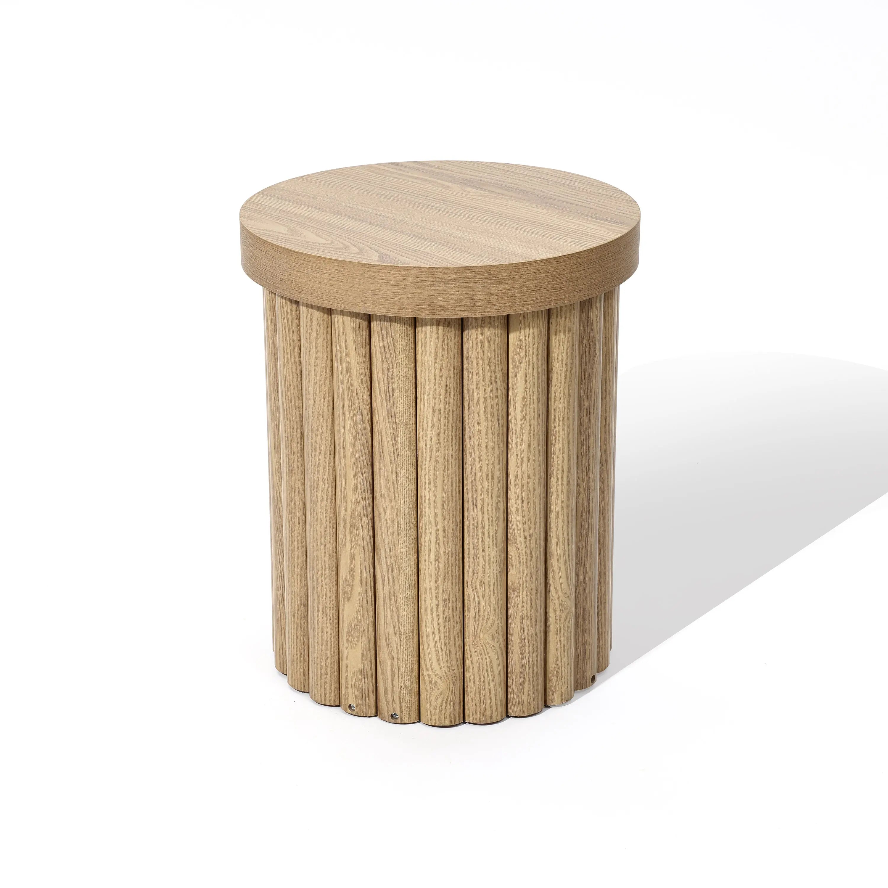 A round wooden end table with a fluted drum design, featuring a flat circular top and a column-like base in an elegant oak finish.
