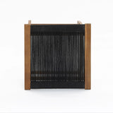 Crafted with FSC-certified acacia wood, this wooden-framed stool features tightly woven black cords for the seat. It stands elegantly against a plain white backdrop, showcasing its refined design and sustainability.