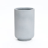Gray, cylindrical ceramic vase with a smooth, matte finish on a white background, perfect for modern minimalist decor.