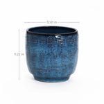 The LuxenHome Ocean blue glazed round ceramic planter features a glossy, gradient blue finish with a diameter of 12.01 inches and a height of 11.22 inches.