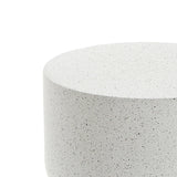 The image features a speckled white cylindrical outdoor side table made of durable MGO with a minimalist design, perfect for modern settings. It is elegantly captured against a white background.
