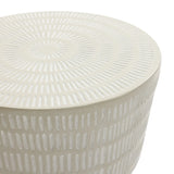 The LuxenHome Meru outdoor side table is a beige, round ceramic piece featuring a minimalist design with small, elongated dashes in concentric circles on the surface and vertical lines down the sides.