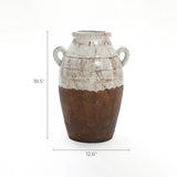 The LuxenHome rustic cream and brown terracotta urn vase with handles stands 18.5 tall, showcasing artisanal craftsmanship with a textured brown lower half and smooth white upper half, offering rustic elegance to any space.