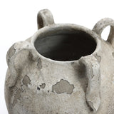 A close-up of the Rustic gray and white terracotta vase with handles by LuxenHome, measuring 11 in height. This piece showcases a weathered surface with three curved handles, blending contemporary elegance with its antiqued texture.