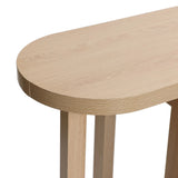 Close-up of the LuxenHome Lorean console table with a natural finish, highlighting its smooth oval-edged surface and grain pattern. The four legs in the bottom right corner accentuate its minimalist design.