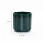 The Jade green ribbed glazed round ceramic planter by LuxenHome features a 13 height and a modern translucent green hue, adding charm to any space with its elegant cylindrical design.