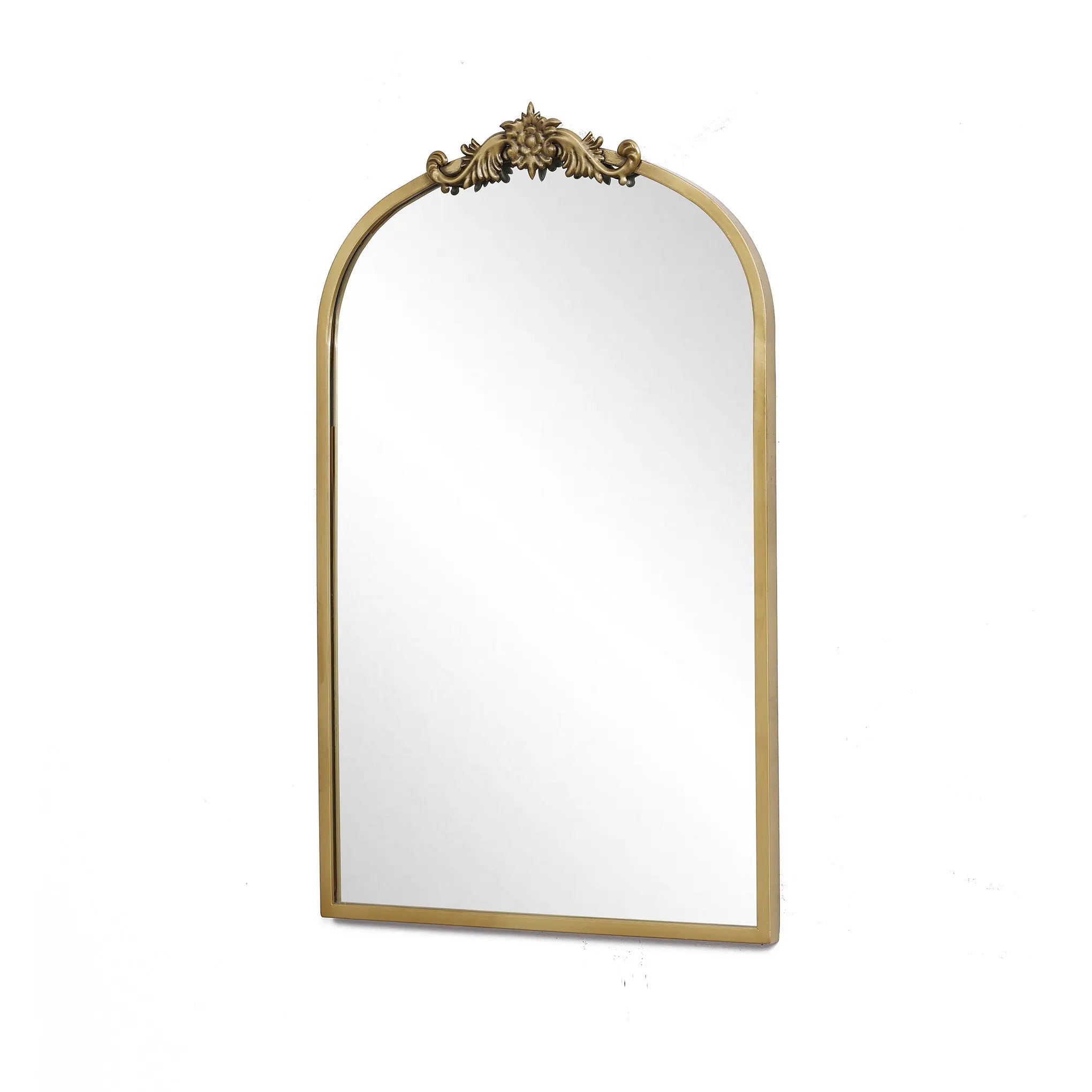 The LuxenHome Rêverie vintage gold accent mirror features an ornate metal frame with intricate detailing, resembling an arched window silhouette, set against a plain white background.