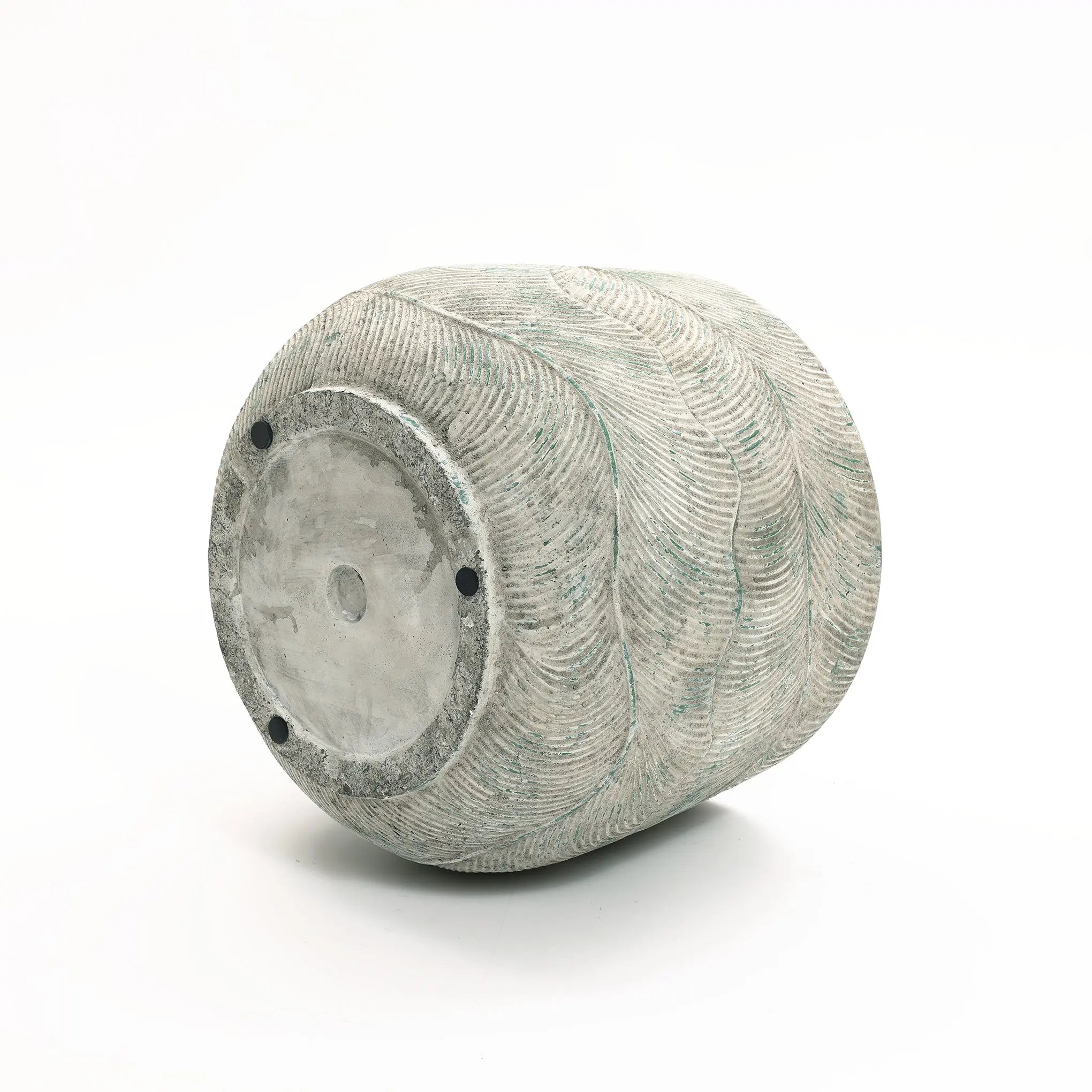 The LuxenHome Rustic Multi-Color Cement 14-Inch Round Planter is a large, cylindrical stone sculpture with textured wavy lines and a smooth base featuring four small black dots around a central circle, set against a plain white background.