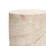 Experience the charm of a travertine-style side table, featuring a textured cylindrical design with vertical grooves. The natural beige and brown patterns stand out beautifully against a white background, perfectly enhancing both indoor and outdoor aesthetics.