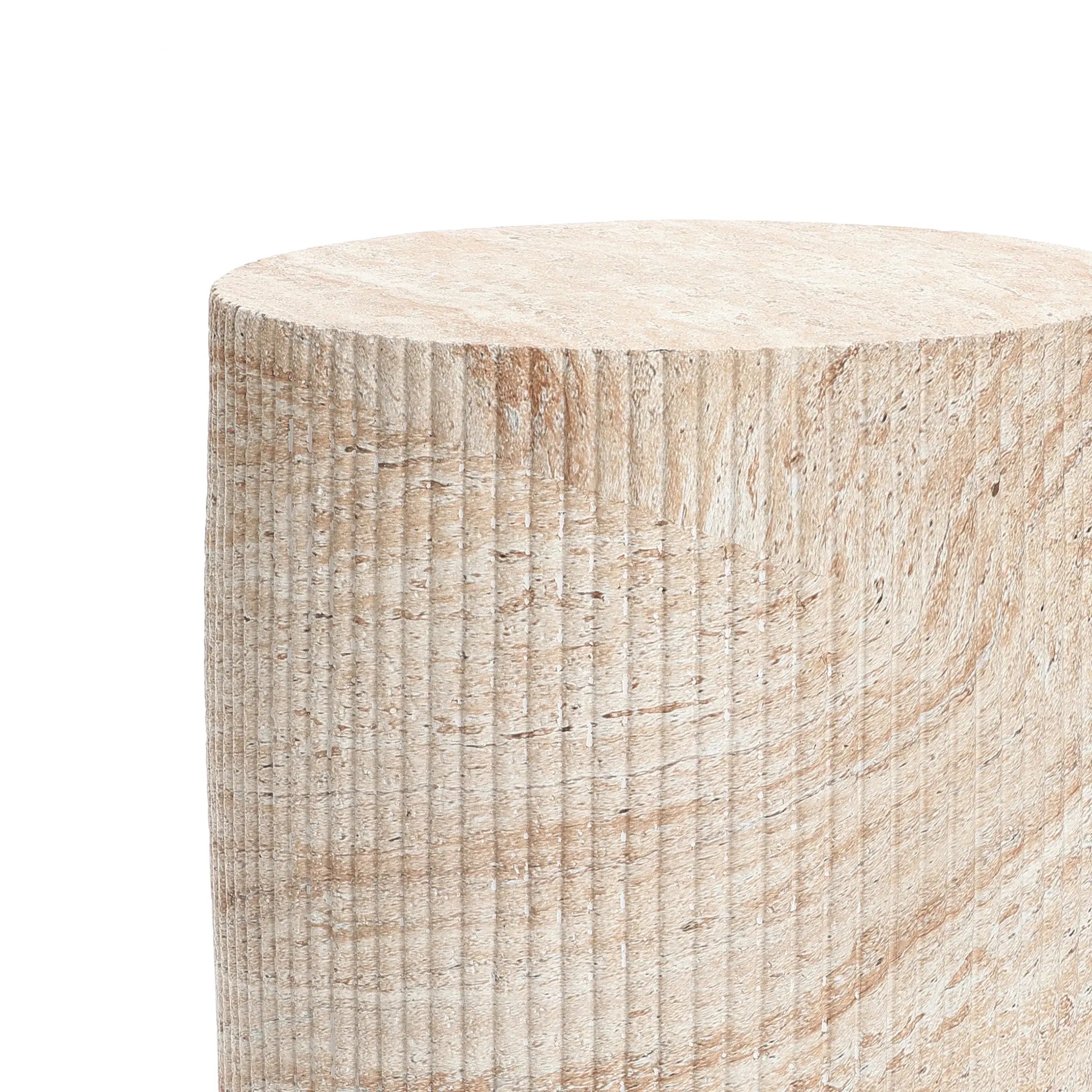 Experience the charm of a travertine-style side table, featuring a textured cylindrical design with vertical grooves. The natural beige and brown patterns stand out beautifully against a white background, perfectly enhancing both indoor and outdoor aesthetics.