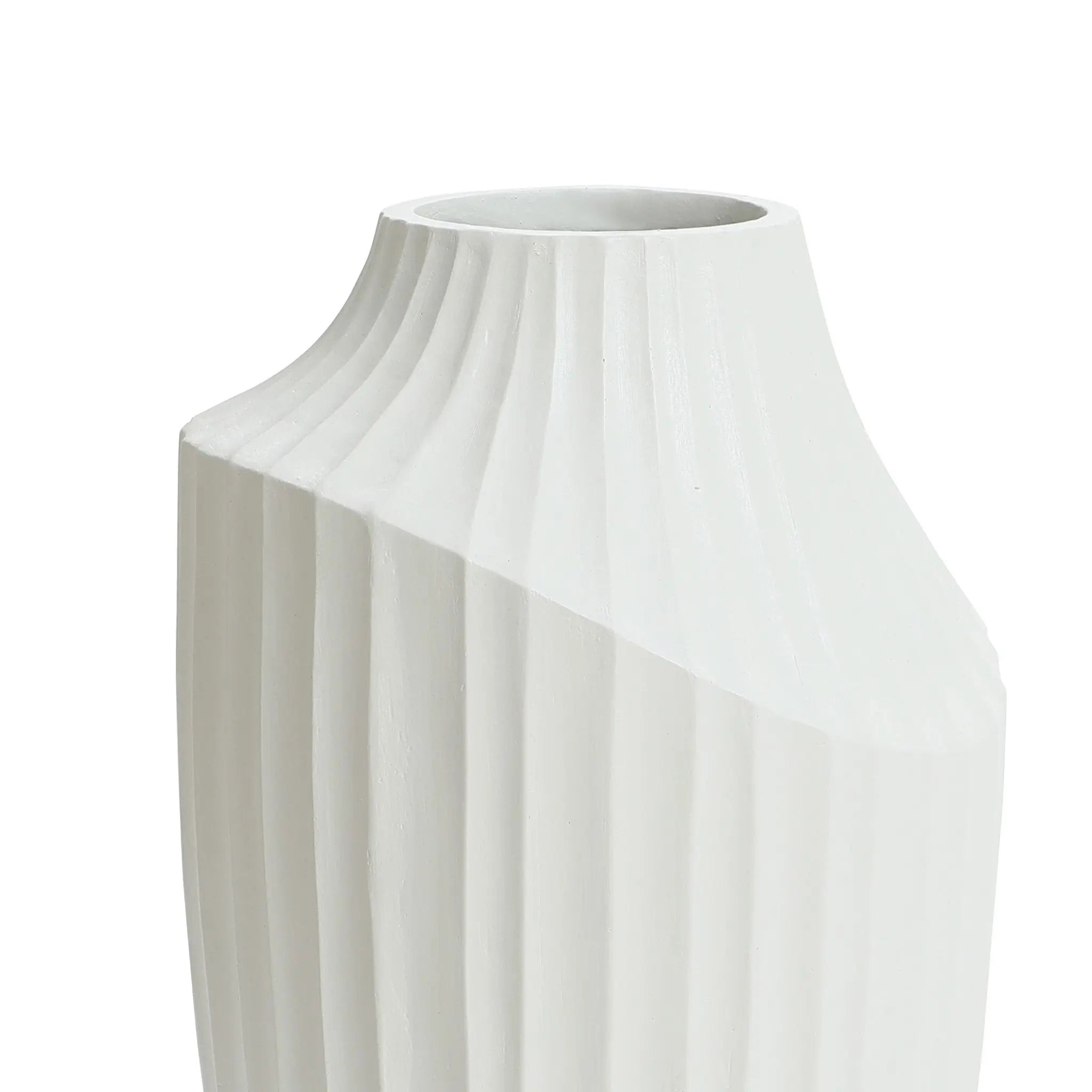 A white ceramic vase with a ribbed texture and an asymmetrical opening, this modern abstract sculpture vase is a striking decorative piece, perfect for adding a touch of contemporary home decor to your space.