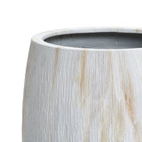 Close-up of a white textured cylindrical container with subtle vertical ridges and brown streaks, reminiscent of a Marble Texture Planter.