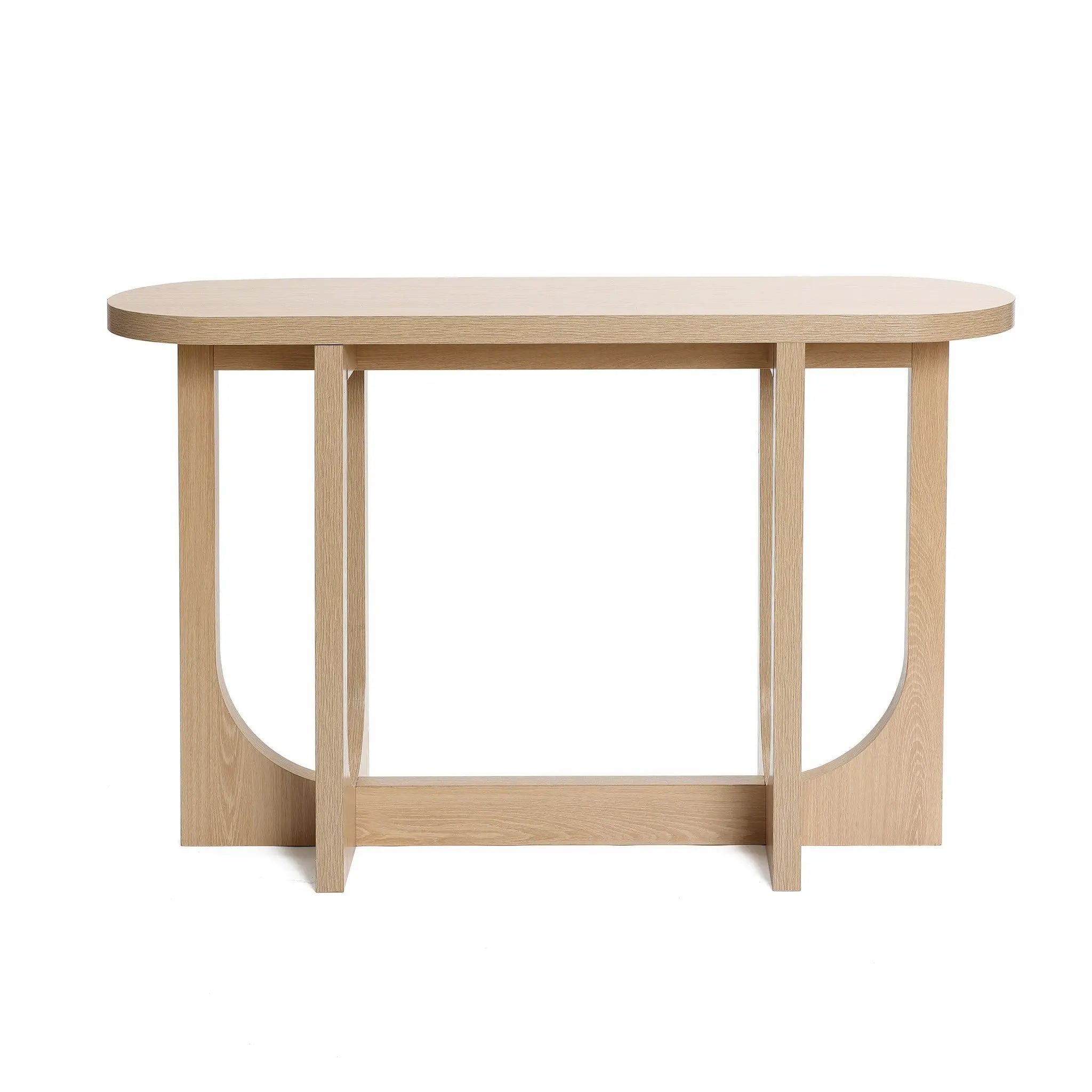The Lorean console table by LuxenHome features a natural wood finish with an oval top and a distinctive base of two vertical panels joined by curved supports, epitomizing minimalist design and contemporary elegance.