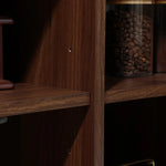 Close-up of the Aria 2-door tambour accent cabinet by LuxenHome, in a dark oak finish. The wooden unit has intersecting shelves, one with a glass jar of coffee beans. Visible small holes suggest adjustable shelves or tambour door functionality.