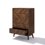 The LuxenHome Theo 5-drawer chest, featuring a mid-century modern design with a herringbone pattern, is crafted in a walnut finish. Its bottom drawer appears slightly open, and the vertical dresser stands on angled legs, casting a shadow on the white background.