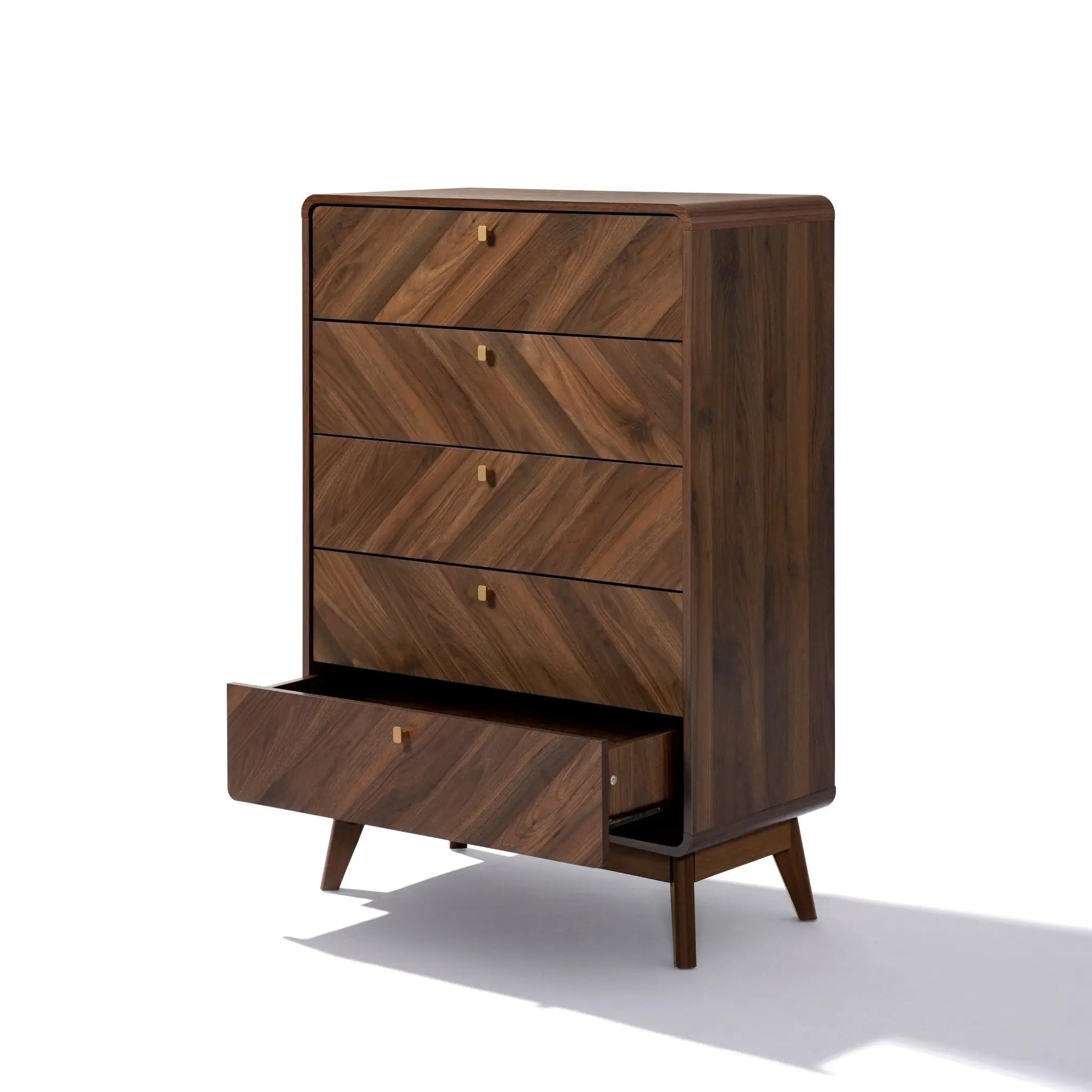The LuxenHome Theo 5-drawer chest, featuring a mid-century modern design with a herringbone pattern, is crafted in a walnut finish. Its bottom drawer appears slightly open, and the vertical dresser stands on angled legs, casting a shadow on the white background.