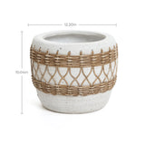 A white ceramic planter in bohemian style features brown woven rope detailing, measuring 12.20 inches in diameter and 10.04 inches in height.