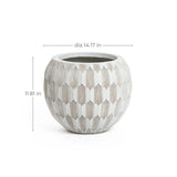 The LuxenHome White and Beige Planter is a round ceramic pot with a geometric design, featuring vertical lines forming a striking hexagonal pattern. It measures 14.17 in diameter and 11.81 in height, blending style and function seamlessly.