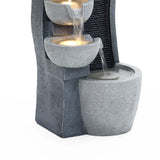 Modern cascading resin outdoor water fountain with LED lights - LuxenHome