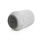 A modern design featuring a gray and white speckled texture, this cylindrical object boasts a flat black base. Displayed on a pristine white background, its lightweight yet durable, showcasing the craftsmanship of an MgO planter.