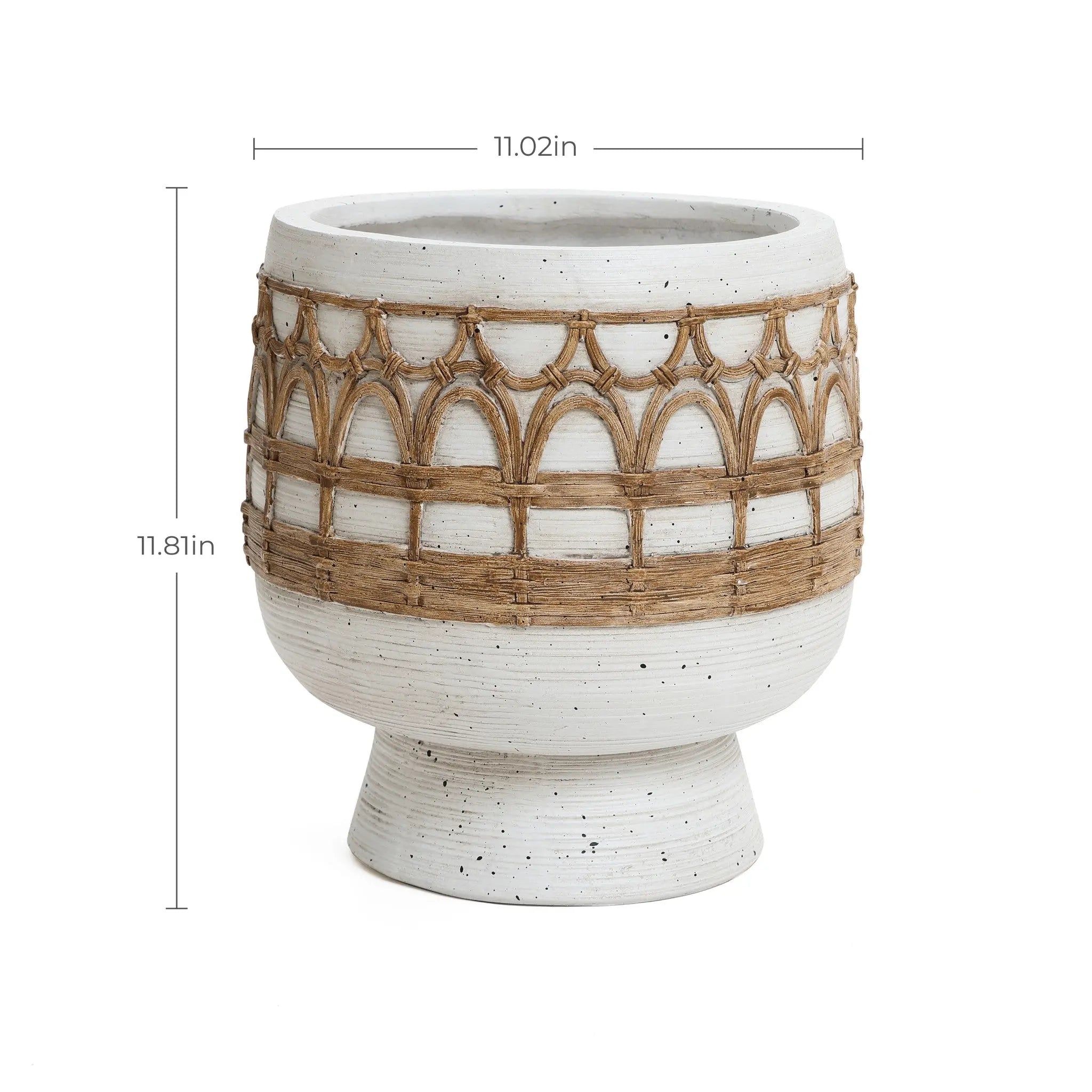 A round, textured white planter, crafted from magnesium oxide with Bohemian style brown wicker accents, measures 11.02 inches wide and 11.81 inches tall.