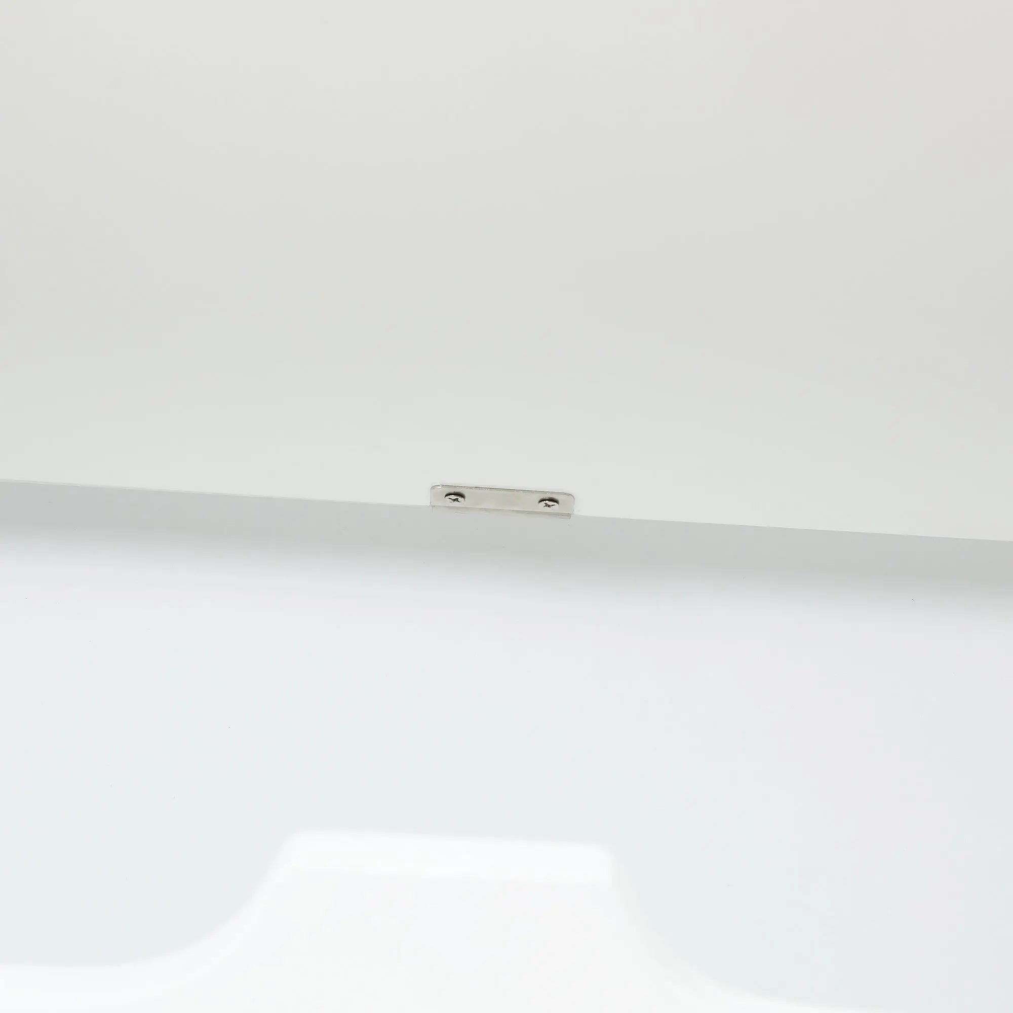 A metal mounting bracket with two screws is attached to a flat white surface, ideal for securely installing a coat rack or hall tree.