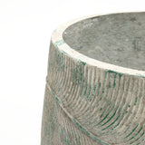 The LuxenHome Rustic Multi-Color Cement 14-Inch Round Planter features a rough gray surface with subtle green accents. Its ridged, arching exterior pattern creates a tactile and visually engaging design, standing out against its light-colored background.