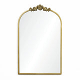The Rêverie vintage gold accent metal frame arch mirror from LuxenHome features intricate floral detailing and resembles an elegant arched window silhouette, perfectly set against a plain white background.