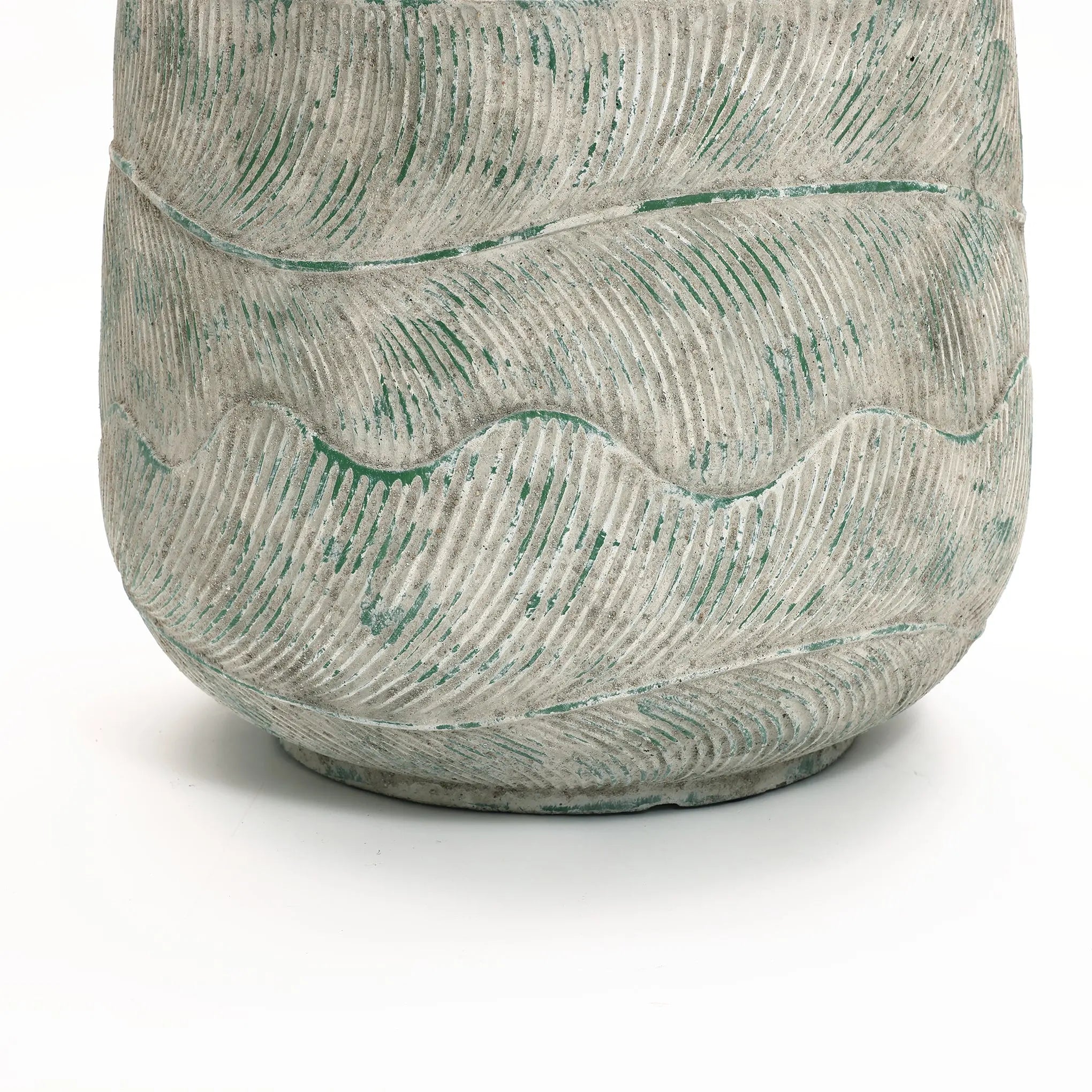 A close-up of the LuxenHome Rustic Multi-Color Cement 14-Inch Round Planter features wavy, raised patterns. Its light grey with green accents on ridges elevates the intricate design, set against a plain white background for emphasis.