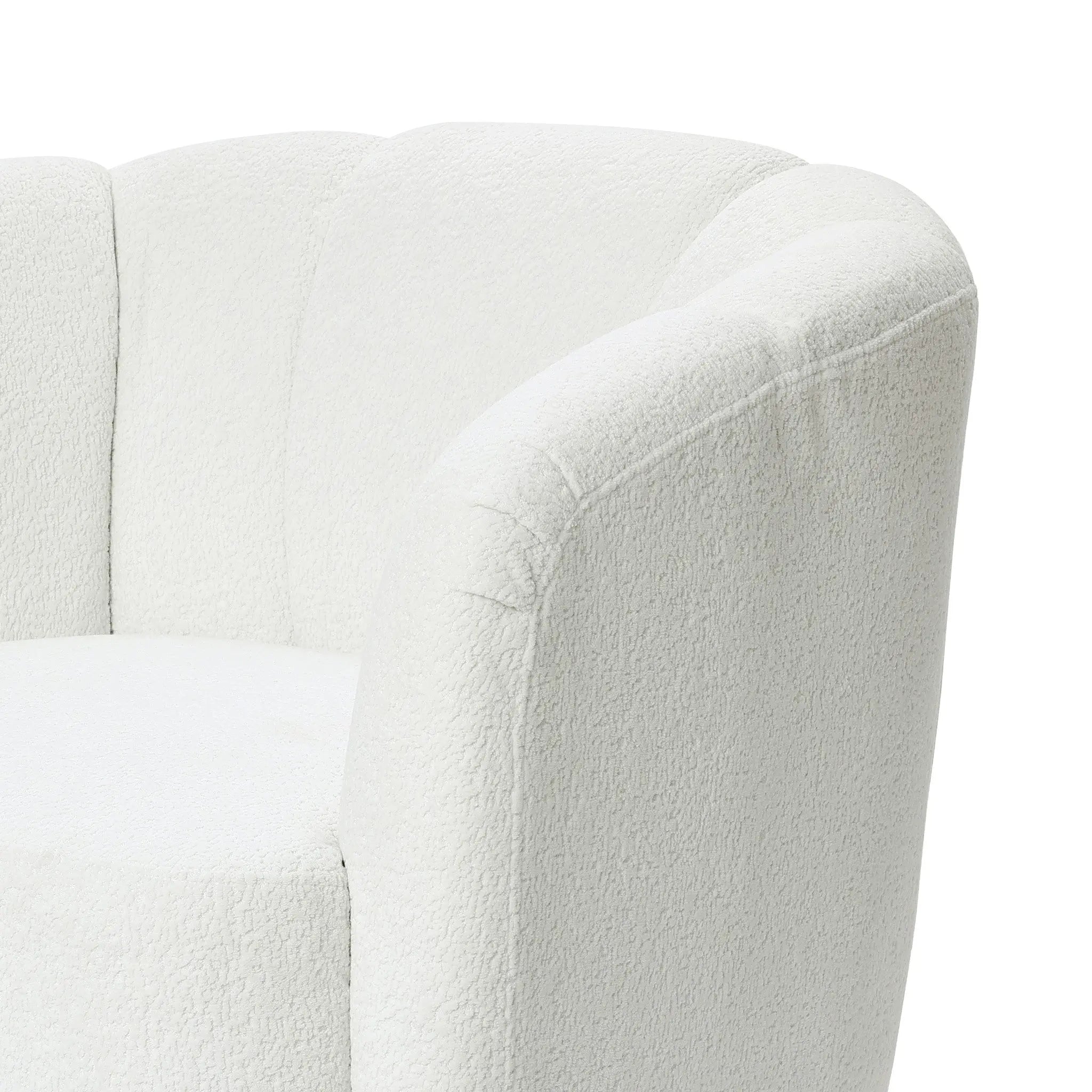 A close-up view of the LuxenHome Amber ivory boucle swivel barrel accent chair showcases its curved backrest and rounded edges. The plush light-colored fabric gives a cozy and chic appearance, focusing on the top and sides of this modern design.