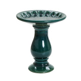 A charming green ceramic birdbath with a fluted bowl and elegant pedestal base, perfect for adding a touch of elegance to your outdoor space.