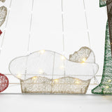 A wireframe nativity scene featuring a glowing baby Jesus figure illuminated by small LED bulbs, set against a white background. This enchanting Christmas decoration is beautifully complemented by the radiant presence of the North Star.